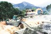 Đổ bê tông bù móng nâng tiết diện đường dây tải điện đoạn qua huyện Đakrông. Ảnh: LK